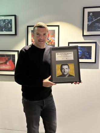 Kevin Bridges Receives Platinum Award